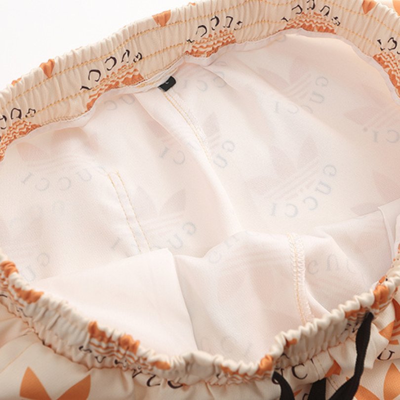 HUKJ-5.jpg GG x Adidas Shorts Trefoil Beige Casual