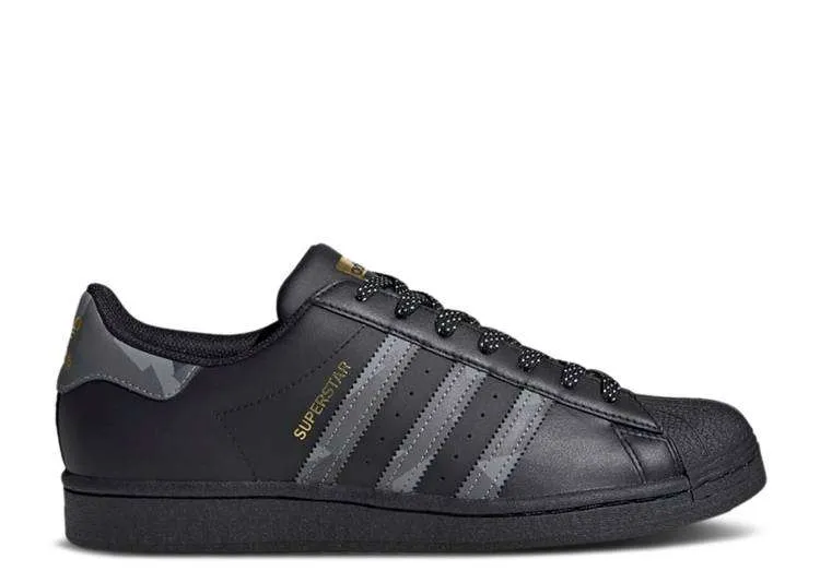 adidas-superstar-black-camo.webp ADIDAS SUPERSTAR ‘BLACK CAMO’