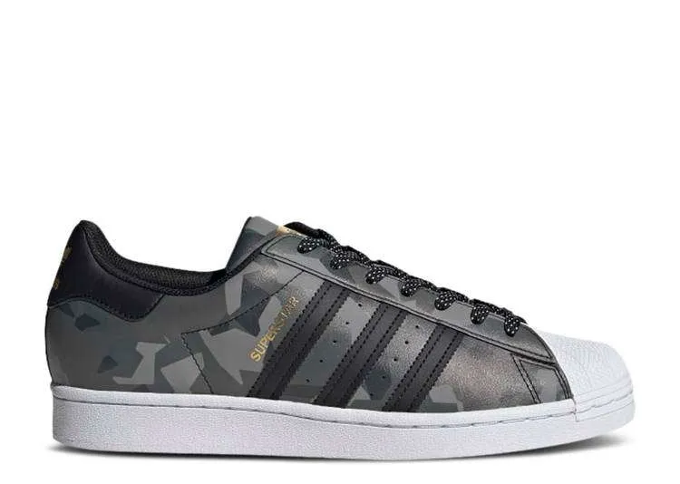 adidas-superstar-black-gold-camo.webp ADIDAS SUPERSTAR ‘BLACK GOLD CAMO’