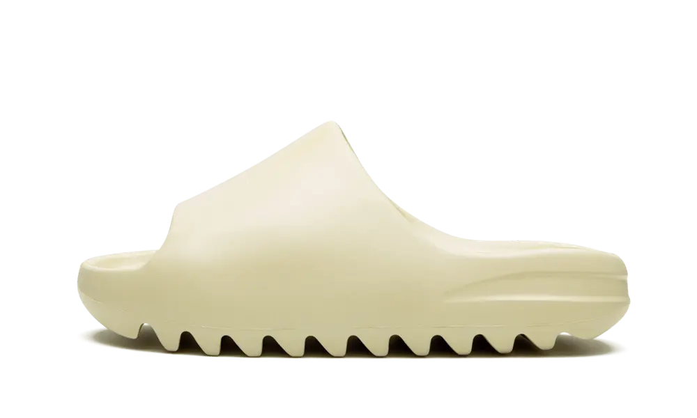 adidas-yeezy-slide-bone.webp Adidas Yeezy Slide – Bone
